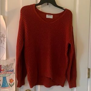 Warm orange knit sweater